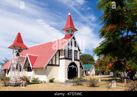 Notre Dame Auxiliatrice Church with distinctive red roof at Cap Malheureux, Mauritius Stock Photo