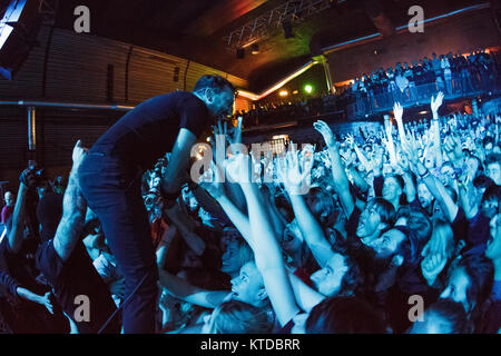 Rise Against, the American melodic hardcore band, performs a live concert at Amager Bio in Copenhagen. Here vocalist Tim McIlrath is seen among the concert crowds. Denmark, 22/11 2014. Stock Photo