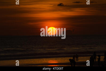 Oreange sunset in Yeh Gangga Beach in Tabanan, Bali - Indonesia. Stock Photo