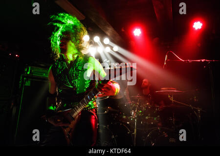 The Polish death metal band Vader performs a live concert at Loppen in Copenhagen. Here guitarist Marek Pajak seen live on stage. Denmark, 05/10 2015 Stock Photo