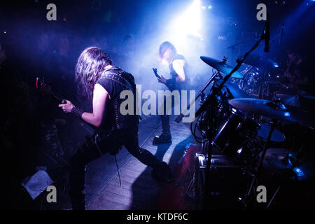 The Polish death metal band Vader performs a live concert at Loppen in Copenhagen. Here bass player Tomasz Halicki seen live on stage. Denmark, 05/10 2015 Stock Photo