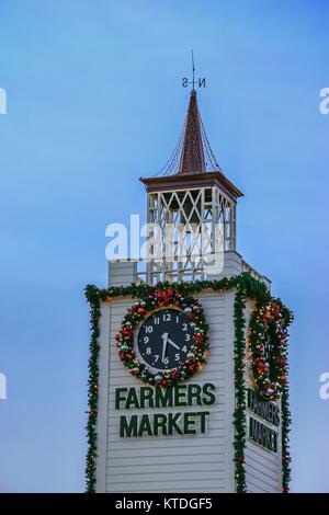 LOS ANGELES, CALIFORNIA, USA, NOVEMBER 26, 2006 - Decorated Christmas of the clock and bell tower of the famous Farmers Market in Los Angeles. Stock Photo