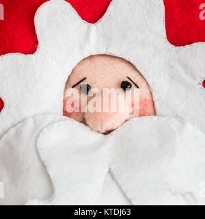 Close view of handmade felt Santa Claus Christmas decoration Stock Photo