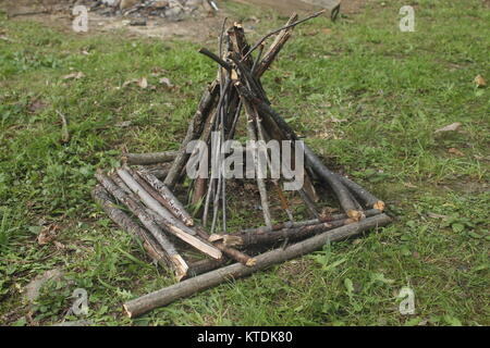 Campground Fire Pit Ready To Burn Using Branches In The Form Of A