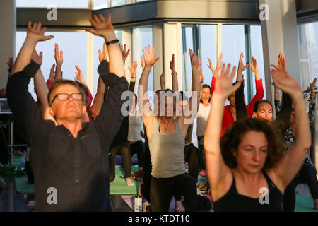 The Dalai Lama's world famous Gyuto Monks of Tibet launches their UK 'Open Mind, Loving Heart Tour' at the UK's tallest building, The Shard. Following on from their recent Glastonbury Festival appearance, the celebrated Tantric Choir performs their sacred music and chanting at The View from The Shard, with Yogasphere. People take part in the Yoga early this morning.  Featuring: Atmosphere Where: London, United Kingdom When: 22 Nov 2017 Credit: WENN.com Stock Photo