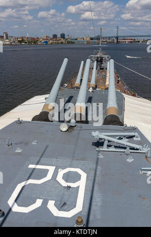 View over 16-inch Main Gun Battery on the forward deck on the USS New Jersey Iowa Class Battleship, Delaware River, New Jersey, United States. Stock Photo