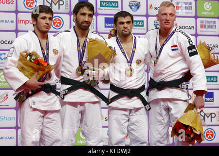 St. Petersburg, Russia - December 17, 2017: Winners in Men U81 during award ceremony of Judo World Masters 2017. Left to right: Lappinagov, Khalmurzae Stock Photo