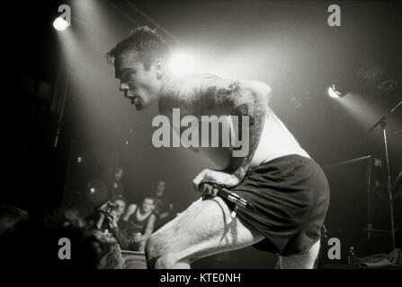 The sweat flies as Rollins Band - led by Henry Rollins, formerly of Black Flag - perform at the Dome in London. June 30 1990. Stock Photo