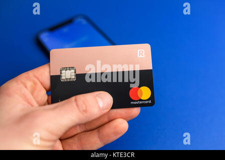 KAUNAS, LITHUANIA - DECEMBER 23, 2017: Closeup view of REVOLUT card. Revolut is a digital banking alternative that includes a pre-paid debit card (Mas Stock Photo