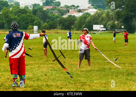 Lviv, Ukraine - July 23, 2017: Unknown aircraft modelers prepares to launch his own radio-controlled  model  gliders  in the countryside near the city Stock Photo