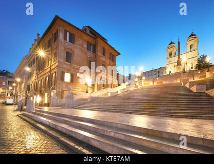Monumental staircase Spanish Steps and and Trinita dei Monti church, evening view from Piazza di Spagna in Rome, Italy Monumental staircase Spanish Steps and and Trinita dei Monti church, evening view from Piazza di Spagna in Rome, Italy