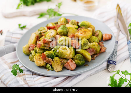 Brussels sprouts. Roasted Brussels sprouts with bacon. Delicious lunch. Stock Photo
