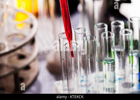 Scientist shows a diffusion in the Petri dish Stock Photo