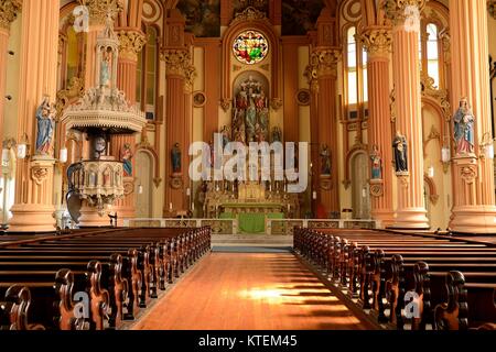St. Marys Assumption Church  - The warm sunlight shines inside of St. Marys Assumption Church, a beautiful German Catholic Church completed in 1860. Stock Photo