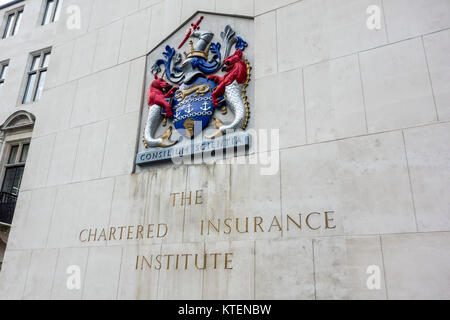 The Chartered Insurance Institute sign and shield or crest in the City of London. Consilium scientia Stock Photo