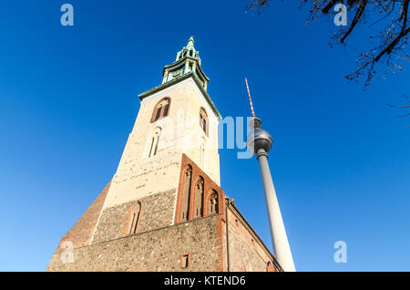 St. Mary's Church /Marienkirche - redbrick Gothic church - and Berliner Fernsehturm / television tower / TV tower, Karl-Liebknecht-Straße, Mitte, Berl Stock Photo