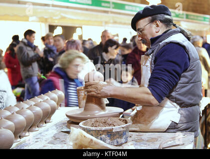 A potter at a market in Valencia Spain Stock Photo