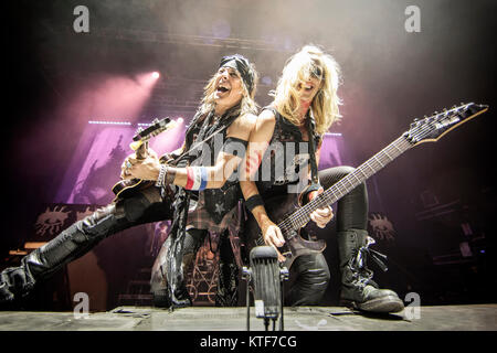 The American singer, songwriter and musician Alice Cooper performs a live concert at Sentrum Scene in Oslo. Here guitarists Ryan Roxie and Nita Strauss are seen live on stage. Norway, 01/07 2015. Stock Photo