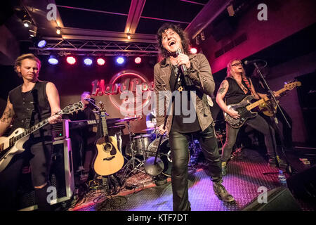 The Norwegian rock band Ammunition performs a live concert at Hard Rock Cafe in Oslo. Here vocalist Åge Sten Nilsen is seen live on stage with guitarist Erik Mårtensson (L) and bass player Victor Cito Borge (R). Norway, 09/03 2017. Stock Photo