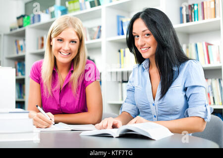 Students learning in library Stock Photo