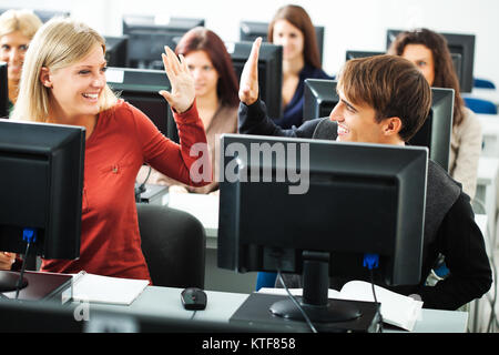 Students learning in computer lab Stock Photo - Alamy