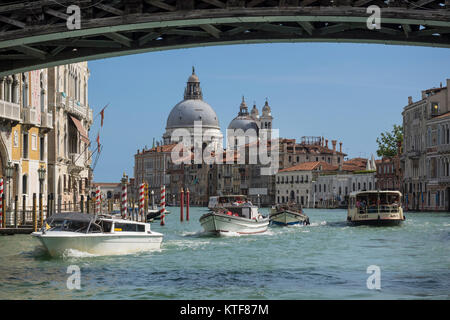 VENICE, ITALY SEPTEMBER - 13, 2017:   View along the Grand Canal to Basilica di Santa Maria della Salute from underneath the Ponte dell'Accademia Stock Photo