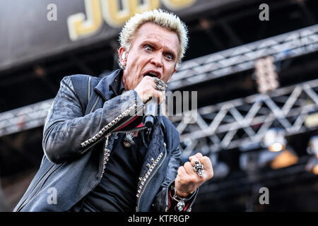 Billy Idol, the English singer and songwriter, performs a live concert at the Swedish music festival Sweden Rock Festival 2014. Sweden, 07/06 2014. Stock Photo