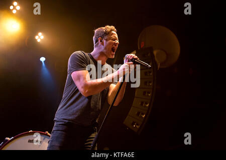 The American rock band Imagine Dragons performs a live concert at Sentrum Scene in Oslo. Here lead singer and songwriter Dan Reynolds is seen live on stage. Norway, 07/11 2013. Stock Photo