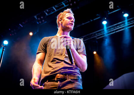 The American rock band Imagine Dragons performs a live concert at Sentrum Scene in Oslo. Here lead singer and songwriter Dan Reynolds is seen live on stage. Norway, 07/11 2013. Stock Photo