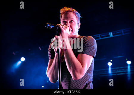 The American rock band Imagine Dragons performs a live concert at Sentrum Scene in Oslo. Here lead singer and songwriter Dan Reynolds is seen live on stage. Norway, 07/11 2013. Stock Photo