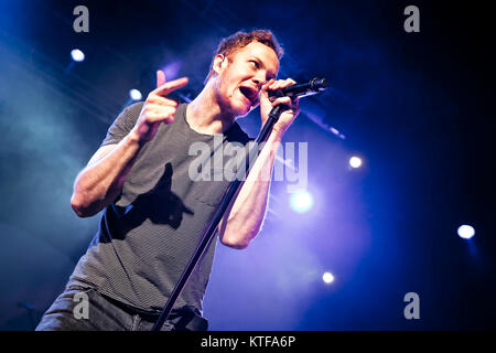 The American rock band Imagine Dragons performs a live concert at Sentrum Scene in Oslo. Here lead singer and songwriter Dan Reynolds is seen live on stage. Norway, 07/11 2013. Stock Photo