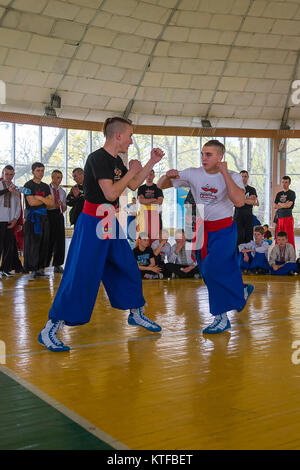 Lviv, Ukraine - April 25.2015: Competitors in the martial arts to perform in the gym in the city park in Lviv, Ukraine Stock Photo