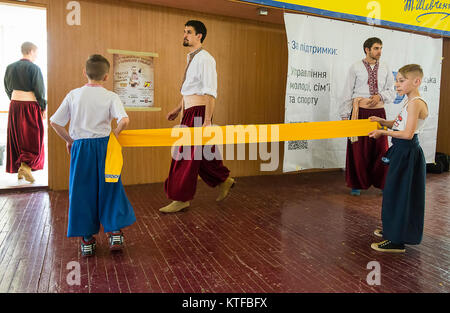 Lviv, Ukraine - April 25.2015: Competitors in the martial arts to perform in the gym in the city park in Lviv, Ukraine Stock Photo