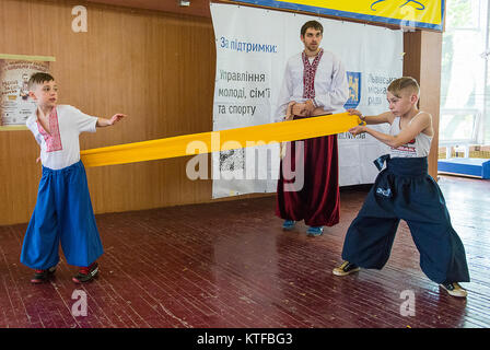 Lviv, Ukraine - April 25.2015: Competitors in the martial arts to perform in the gym in the city park in Lviv, Ukraine Stock Photo