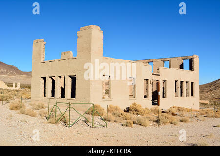 Ruined school building in Rhyolite ghost town near Beatty, Nevada, United States of America. Stock Photo