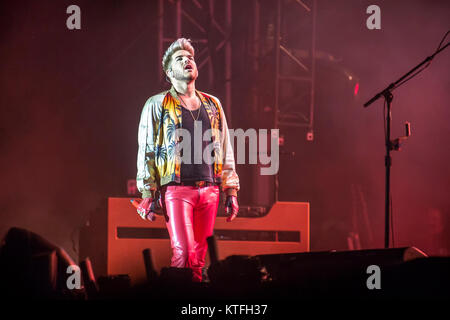 The American singer, songwriter and stage artist Adam Lambert performs a live concert with the active members from the British band Queen at the Swedish music festival Sweden Rock Festival 2016. Sweden, 09/06 2016. Stock Photo