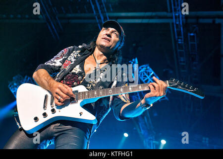 The German rock band Scorpions performs a live concert at Telenor Arena in Oslo. Here musician Matthias Jabs on guitar is seen live on stage. Norway, 10/12 2012. Stock Photo