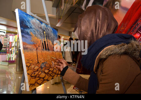 QUETTA, PAKISTAN. Dec-24 2017: Artist from different academies and art centrers drawing the painting during Fine Arts competition Drought Resilient Agriculture Modelling at millennium mall in Quetta Pakistan. Organized by Islamic Relief Stock Photo