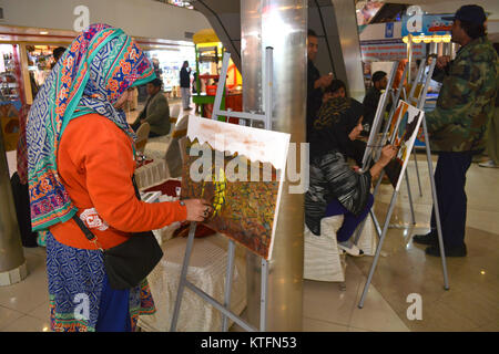 QUETTA, PAKISTAN. Dec-24 2017: Artist from different academies and art centrers drawing the painting during Fine Arts competition Drought Resilient Agriculture Modelling at millennium mall in Quetta Pakistan. Organized by Islamic Relief Stock Photo