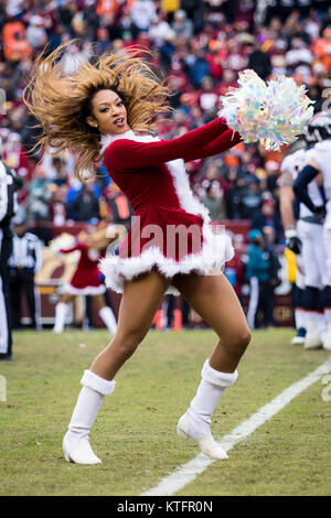 The Denver Broncos cheerleaders perform in their Christmas Holiday uniforms  at the end of the first quarter at Invesco Field at Mile High in Denver on  December 20, 2009. UPI/Gary C. Caskey