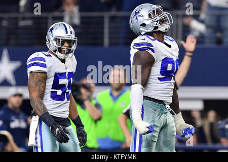 Seattle Seahawks defensive end DeMarcus Lawrence, center, speaks to the ...