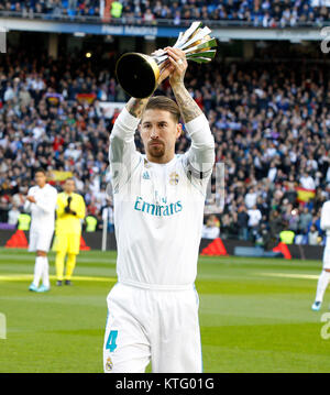 Soccer player Sergio Ramos teaches the public the trophy of the club world cup during the match. La Liga between Real Madrid vs FC Barcelona at the Santiago Bernabeu stadium in Madrid, Spain, December 23, 2017 . Credit: Gtres Información más Comuniación on line, S.L./Alamy Live News Stock Photo