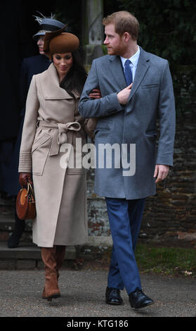 (171226) -- SANDRINGHAM (BRITAIN), Dec. 26, 2017 (Xinhua) -- Prince Harry (R) and Meghan Markle attend Christmas Day Church service at Church of St Mary Magdalene in Sandringham, Britain, on Dec. 25, 2017. (Xinhua) - UK OUT- Stock Photo