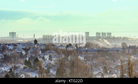 Glasgow, Scotland, UK  26th December.UK Weather: White Boxing day as the city wakens up to sunshine and overnight snow over the Anniesland gasometers, maryhill  and the west end of Glasgow. Credit Gerard Ferry/Alamy Live News Stock Photo
