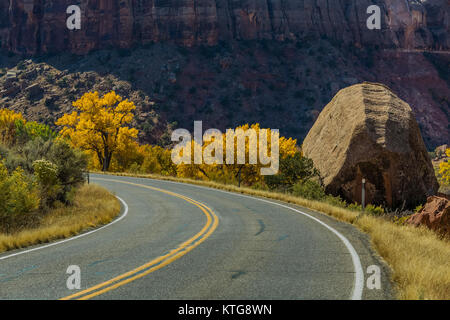 Utah SR 211 winding through the canyons of Indian Creek, along the Indian Creek Corridor Scenic Byway, in Indian Creek National Monument, formerly par Stock Photo