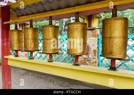 Prayer cylinders in Buddhist datsan Dechen Ravzhalin in Arshan. Buryatia. Russia Stock Photo