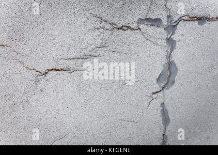 abstract pattern on broken sidewalk asphalt, sacral impression, view from above, full frame Stock Photo