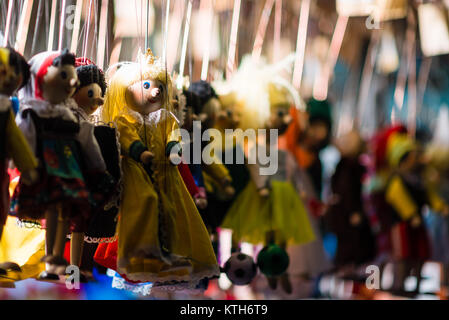Traditional puppets made of wood on a Christmas market in Czech Republic Stock Photo