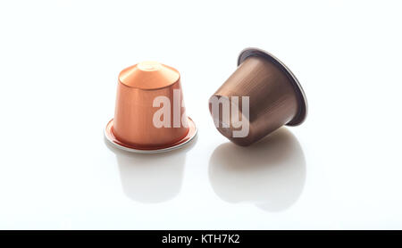 Espresso coffee capsules isolated on white background, Closeup view with details Stock Photo