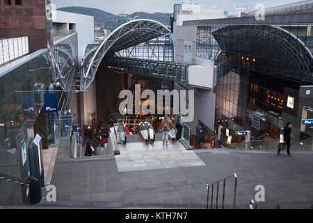 JAPAN, TOKYO-CIRCA APR, 2013: High point at the end of escalators is in Japanese shopping center of the largest Kyoto railway station. Entrance on the Stock Photo